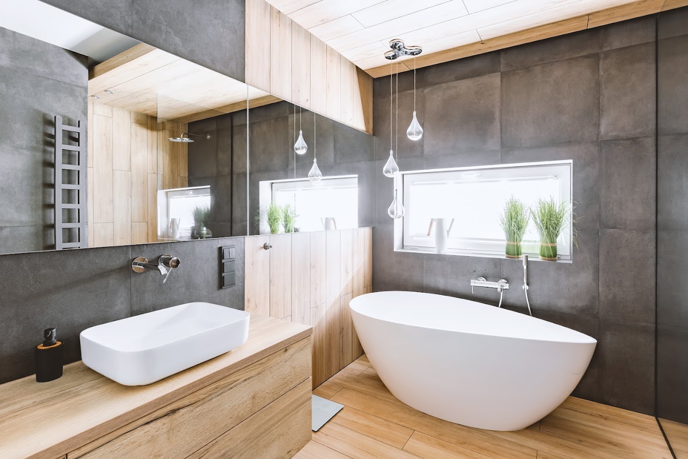 Stylish bathroom with wooden and concrete walls and white bath