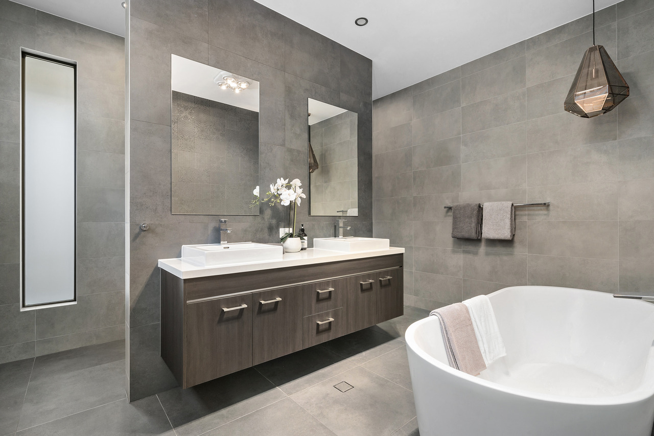 sleek contemporary home bathroom with white fixture