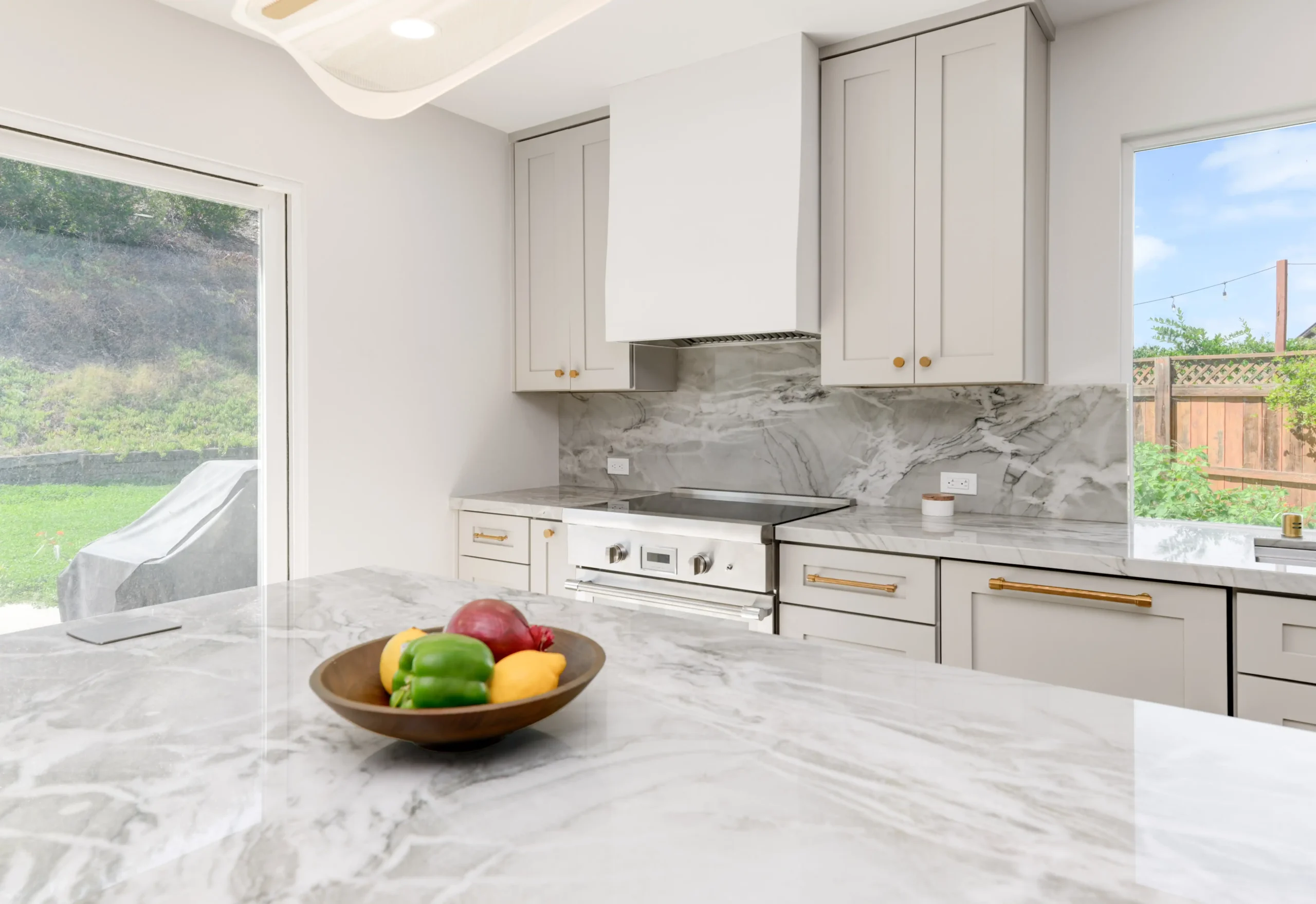 Kitchen relocation with backyard slider door Del Cerro San Diego 92120