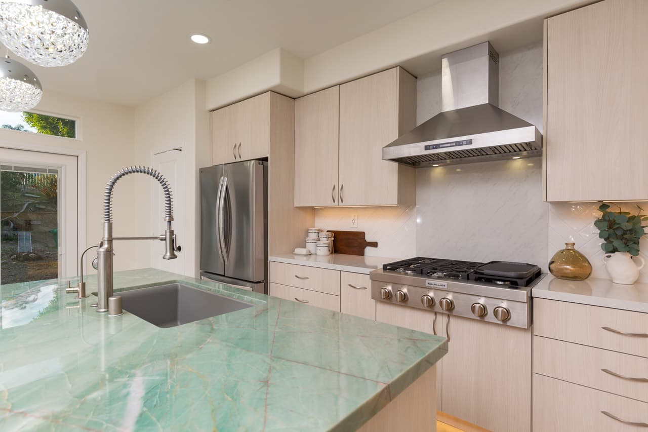 Green quartzite kitchen island with professional faucet Meadow Drive Carlsbad