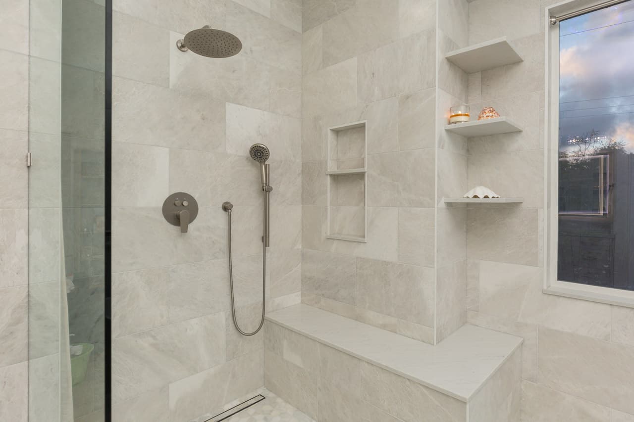 Master bathroom shower with rain head and bench Meadow Drive Carlsbad
