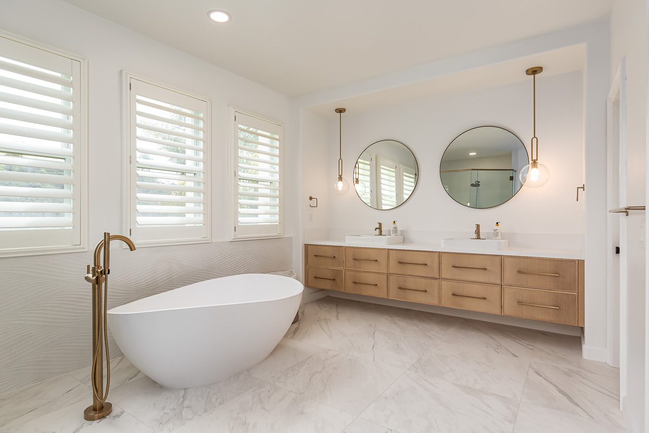 Primary bathroom renovation featuring white oak floating vanity and spa-like shower Carmel Valley 92130