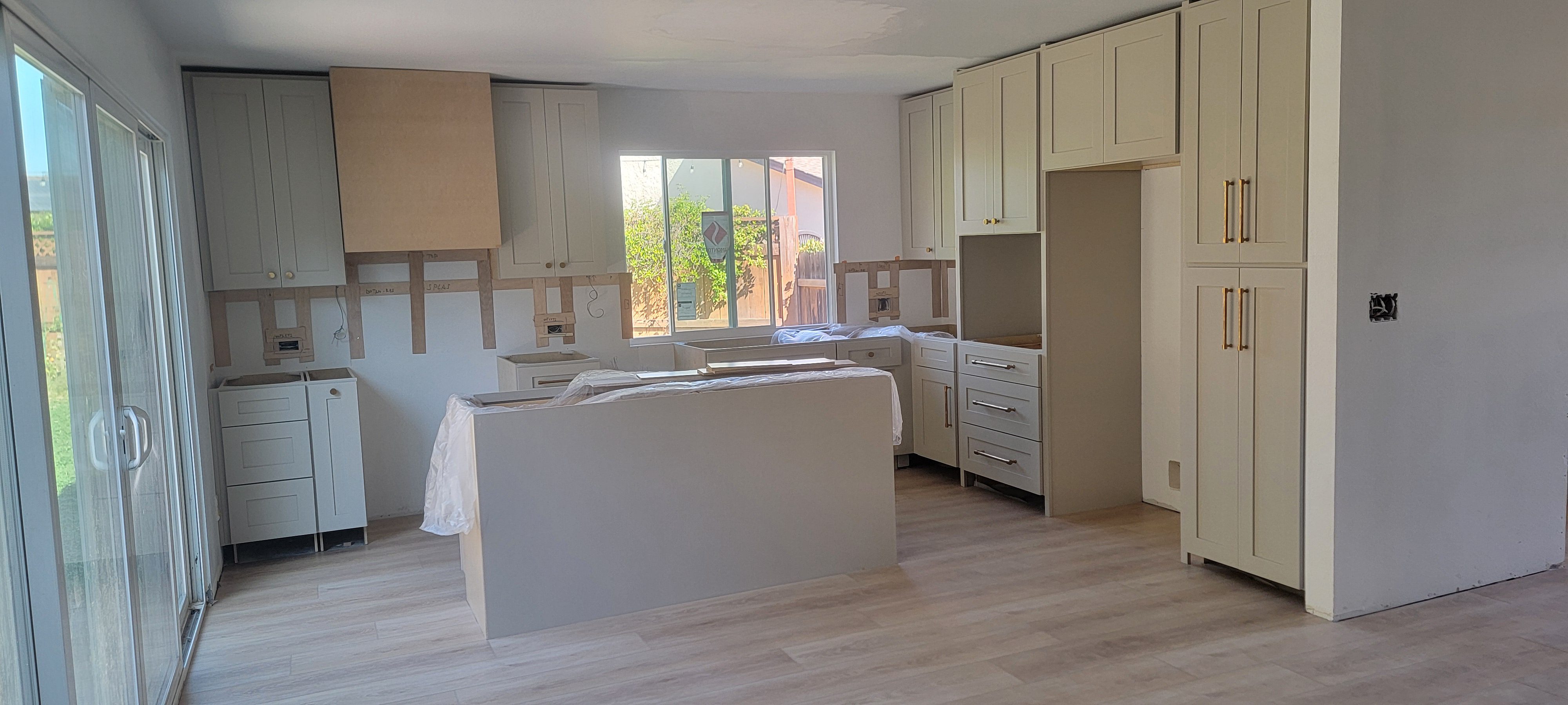 Cabinet installation in progress Del Cerro kitchen remodel San Diego 92120