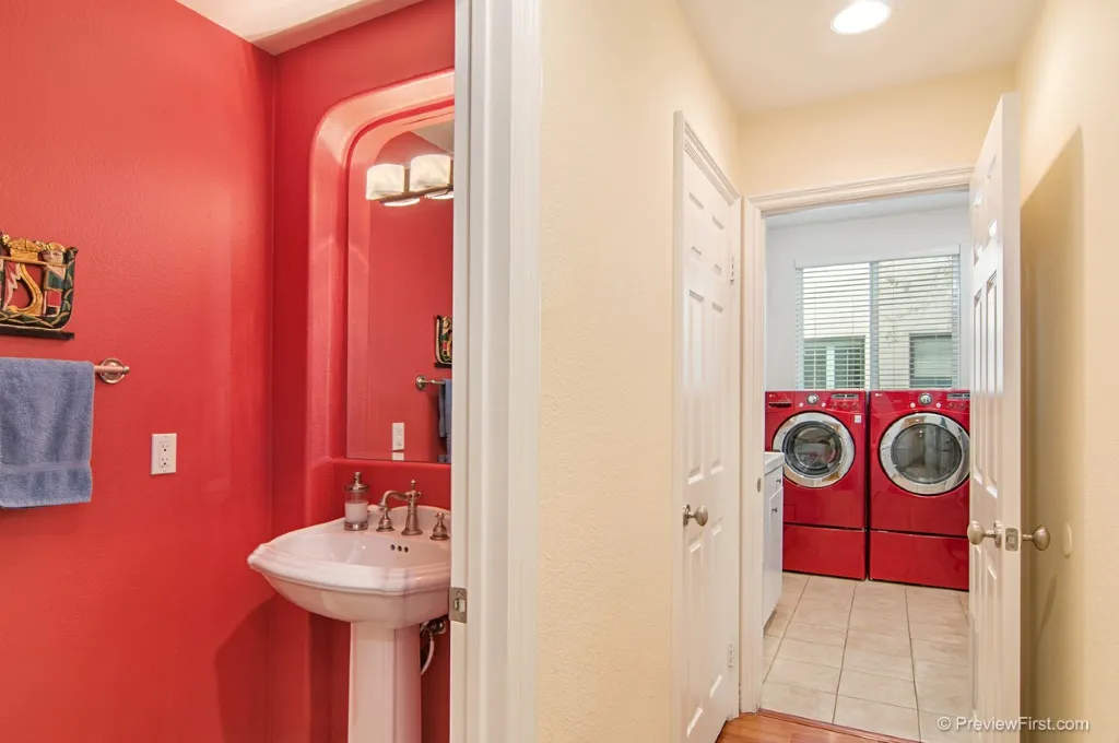 Laundry room and powder room before remodel