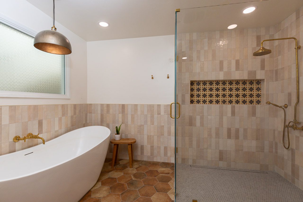 Spanish Revival master bathroom remodel Mission Hills San Diego 92103 — Talavera niche accents, freestanding tub, custom oak vanity