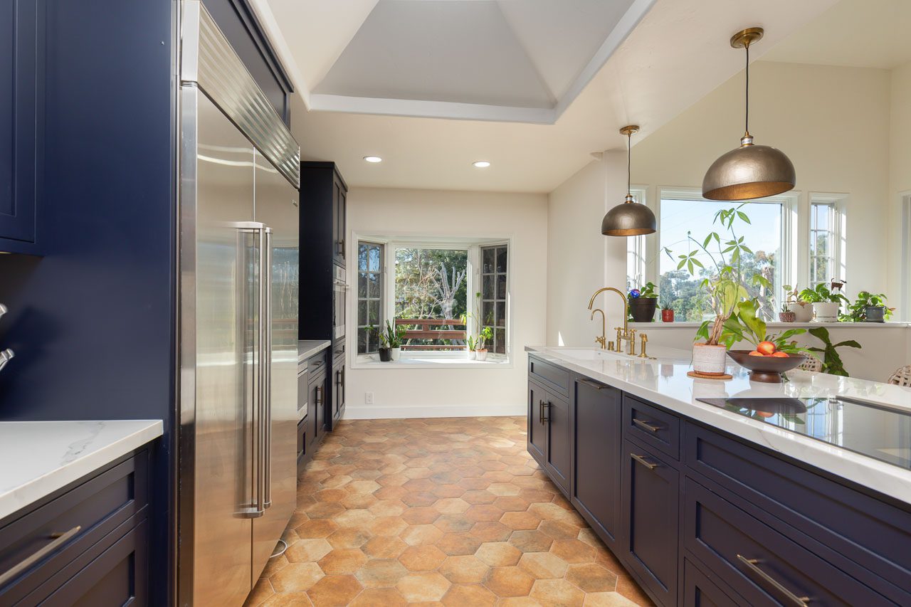 Navy blue inset shaker cabinetry with Sub-Zero refrigerator — historic home remodel Marston Hills Mission Hills San Diego 92103