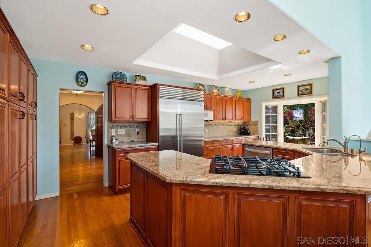 Kitchen before remodel — honey oak cabinets and granite, Mission Hills San Diego