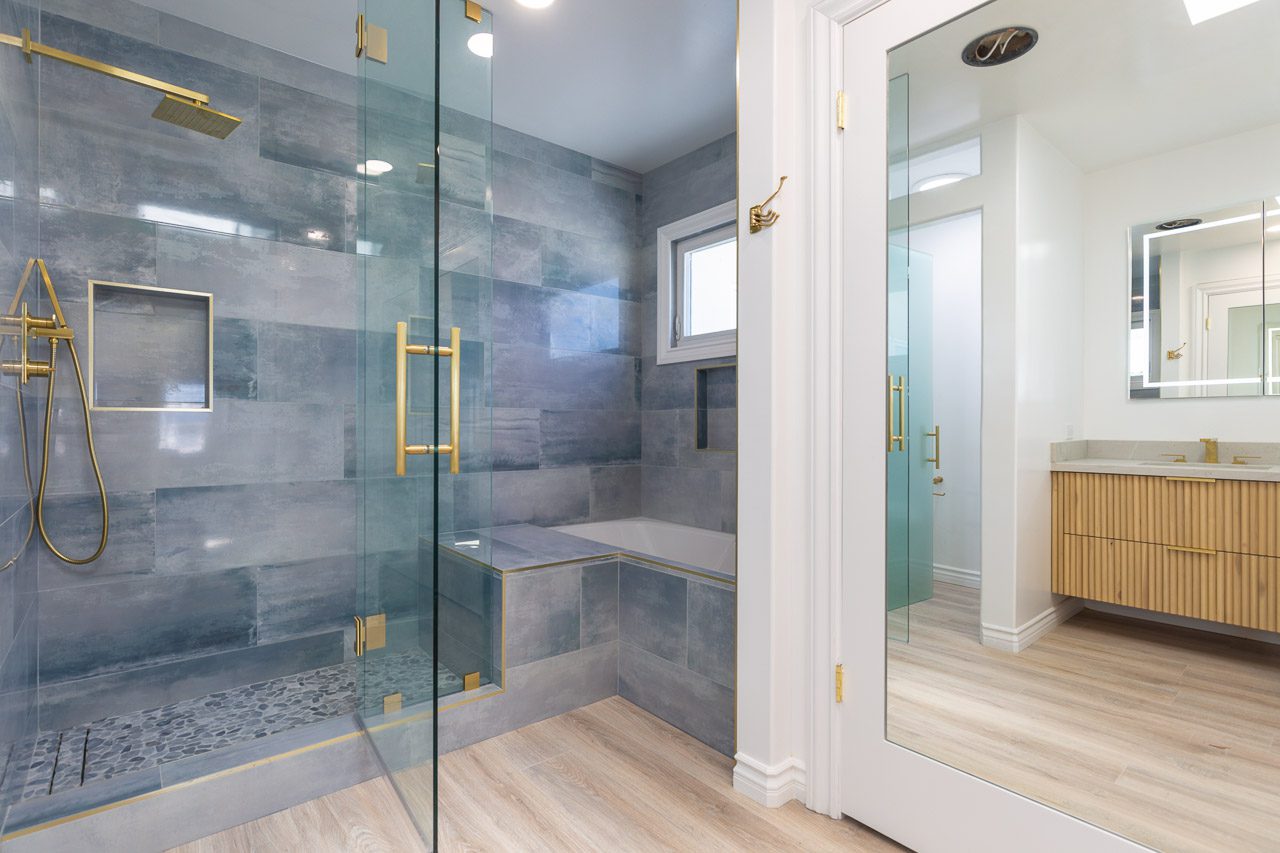 Master bathroom remodel with walk-in shower and fluted vanity San Diego 92118